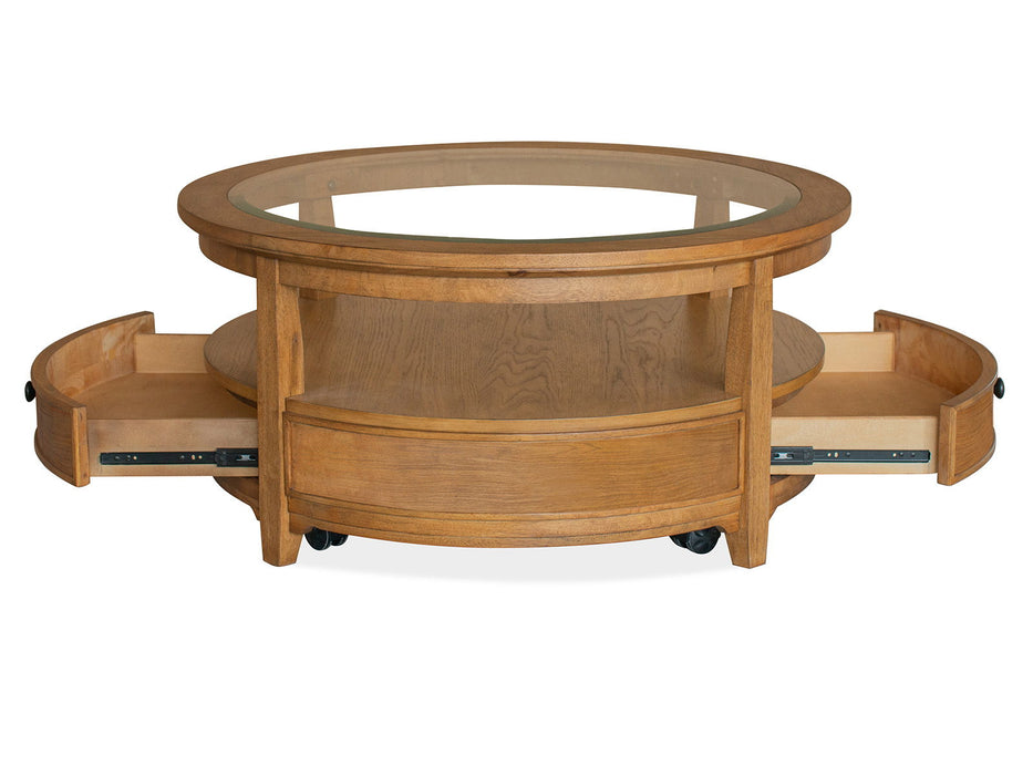 Durant - Round Cocktail Table With Casters - Honey Brown