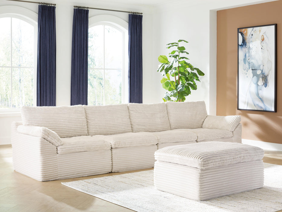 Ashley Express - Fannin 4-Piece Sectional with Ottoman