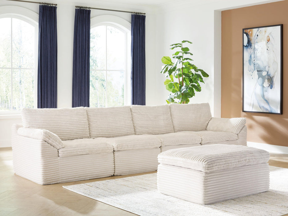 Ashley Express - Fannin 4-Piece Sectional with Ottoman