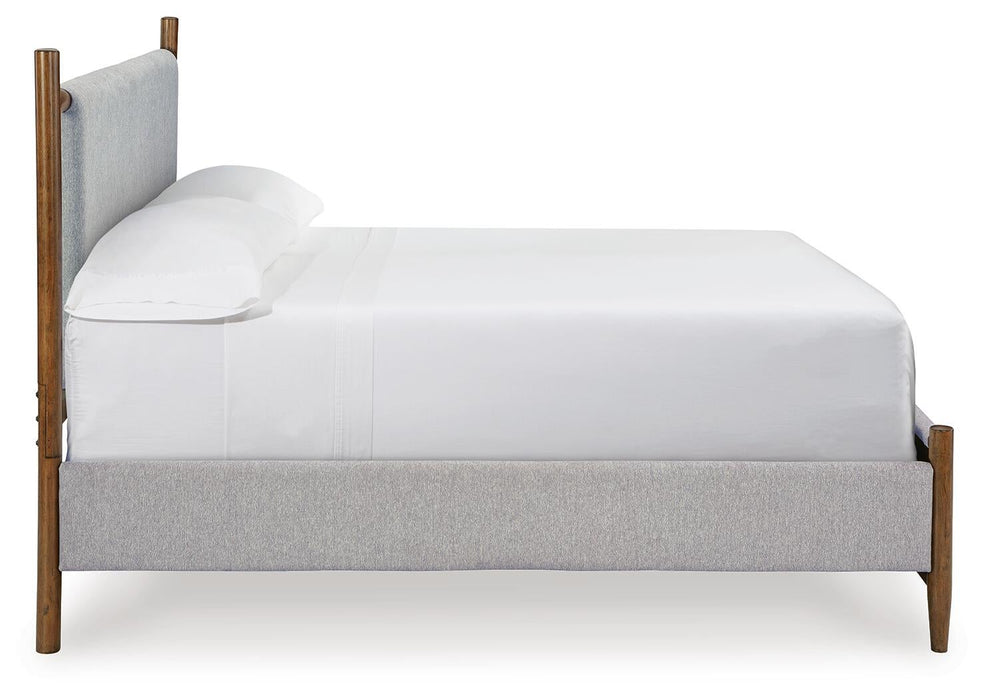 Lyncott Queen Upholstered Bed with Mirrored Dresser