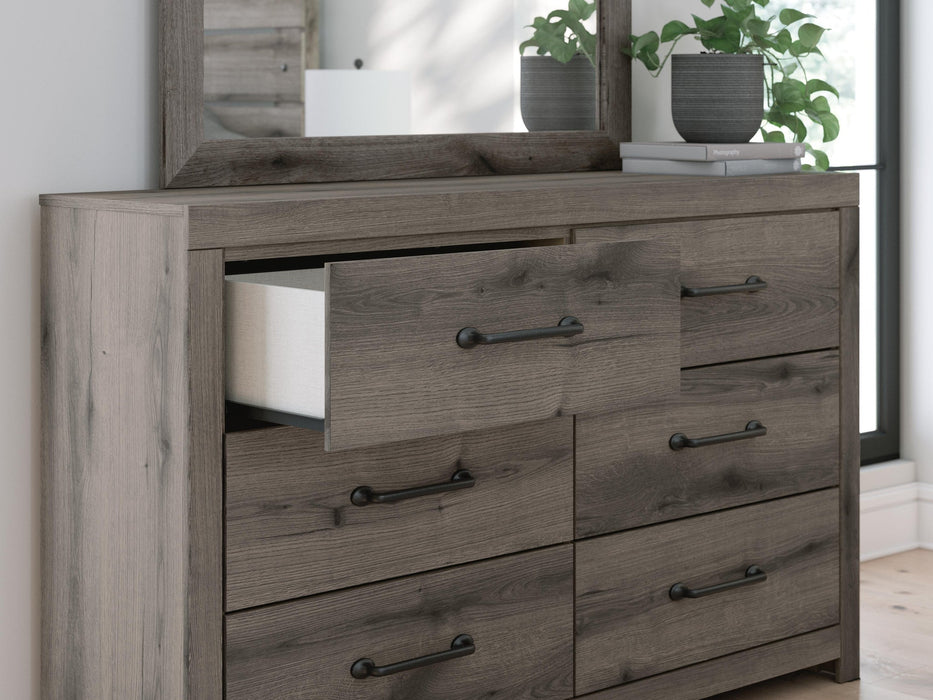 Urbanoore King Panel Bed, Dresser, Mirror, Chest and Nightstand